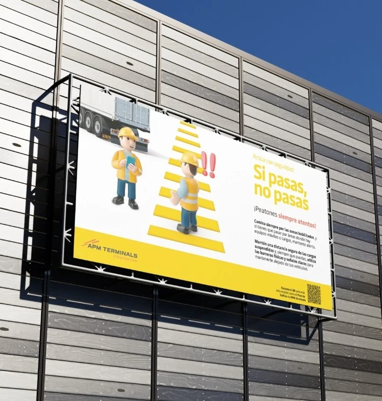 Exemple de disseny gràfic corporatiu per a *APM *Terminals amb campanya de seguretat visual 'Si passes, no passes' en cartell exterior